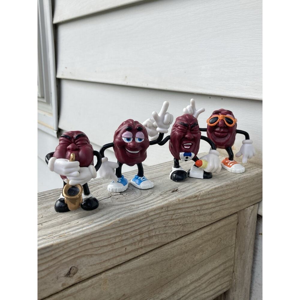Four 1987 California Raisins 2.5+" Sing Dance Saxophone Figures Cake Toppers
